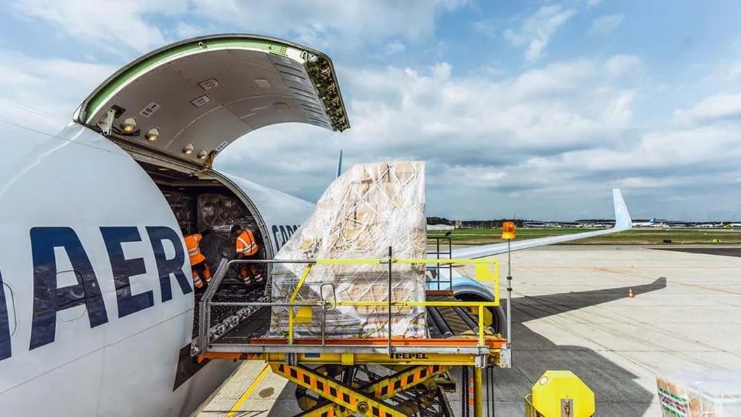 Cargo aircraft being loaded for air freight shipment at Mombasa airport