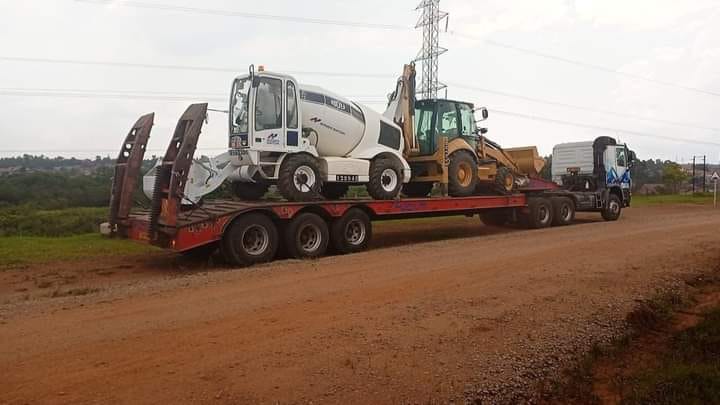 Freight truck transporting cargo on East African highway for cross-border delivery